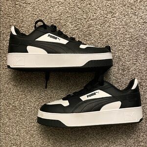 Puma Black and White Low-Top Platform Sneakers